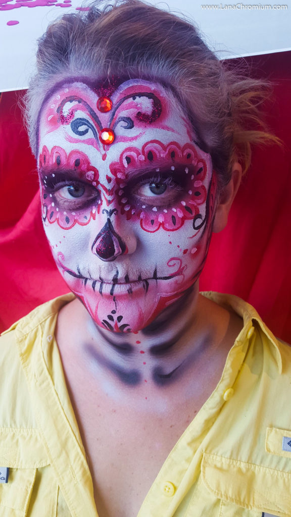 Dia De Los Muertos Face Painting in San Diego. Symbols in Sugar Skulls